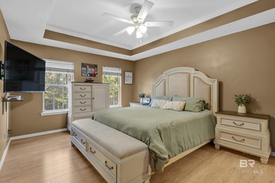 Welcome to this inviting two-story home nestled in the highly on Lake Forest Yacht and Country Club in Alabama - for sale on GolfHomes.com, golf home, golf lot