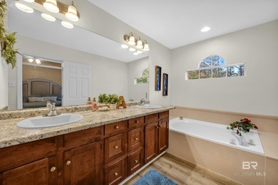 Welcome to this inviting two-story home nestled in the highly on Lake Forest Yacht and Country Club in Alabama - for sale on GolfHomes.com, golf home, golf lot