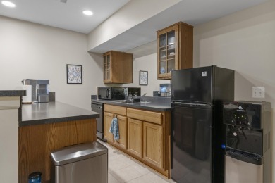Discover your dream ranch condo on the Glacier Bay Golf course on The Glacier Club in Michigan - for sale on GolfHomes.com, golf home, golf lot