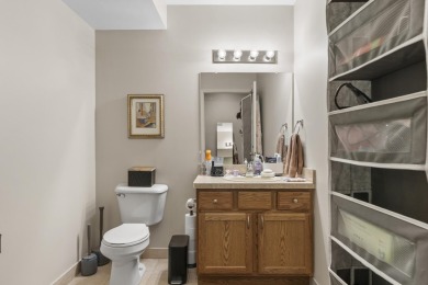 Discover your dream ranch condo on the Glacier Bay Golf course on The Glacier Club in Michigan - for sale on GolfHomes.com, golf home, golf lot