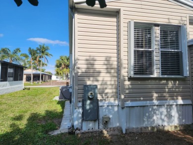 Welcome to this this 2 bd / 2 bath with plenty of space and on Spanish Lakes Fairways in Florida - for sale on GolfHomes.com, golf home, golf lot