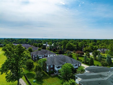 Discover your dream ranch condo on the Glacier Bay Golf course on The Glacier Club in Michigan - for sale on GolfHomes.com, golf home, golf lot