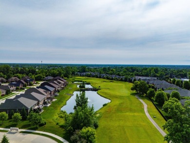 Discover your dream ranch condo on the Glacier Bay Golf course on The Glacier Club in Michigan - for sale on GolfHomes.com, golf home, golf lot