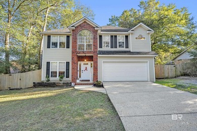 Motivated Seller! Welcome to this inviting two-story home on Lake Forest Yacht and Country Club in Alabama - for sale on GolfHomes.com, golf home, golf lot