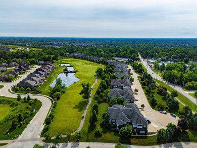 Discover your dream ranch condo on the Glacier Bay Golf course on The Glacier Club in Michigan - for sale on GolfHomes.com, golf home, golf lot