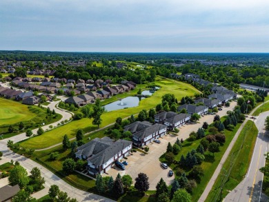 Discover your dream ranch condo on the Glacier Bay Golf course on The Glacier Club in Michigan - for sale on GolfHomes.com, golf home, golf lot