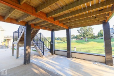Welcome to 3617 Riviera Drive, a beautifully updated 4-bedroom on RidgePointe Country Club in Arkansas - for sale on GolfHomes.com, golf home, golf lot