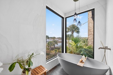 Welcome to 430 Fish Tale, a custom-designed waterfront residence on Daniel Island Club in South Carolina - for sale on GolfHomes.com, golf home, golf lot