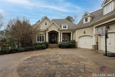 Discover the unique opportunity to experience lakefront living on Reynolds Lake Oconee - The Oconee in Georgia - for sale on GolfHomes.com, golf home, golf lot