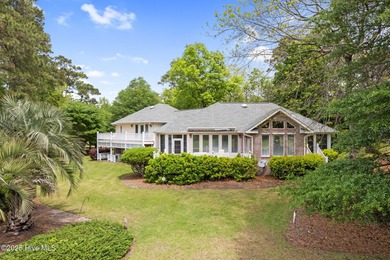 Motivated sellers! This unique, custom-built home rests on on Lockwood Folly Country Club in North Carolina - for sale on GolfHomes.com, golf home, golf lot