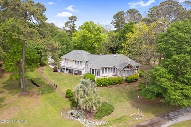 Motivated sellers! This unique, custom-built home rests on on Lockwood Folly Country Club in North Carolina - for sale on GolfHomes.com, golf home, golf lot