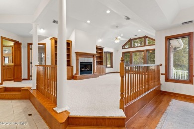 This unique, custom-built home rests on nearly  3/4  of an acre on Lockwood Folly Country Club in North Carolina - for sale on GolfHomes.com, golf home, golf lot