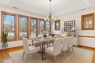 This unique, custom-built home rests on nearly  3/4  of an acre on Lockwood Folly Country Club in North Carolina - for sale on GolfHomes.com, golf home, golf lot