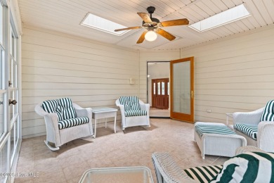This unique, custom-built home rests on nearly  3/4  of an acre on Lockwood Folly Country Club in North Carolina - for sale on GolfHomes.com, golf home, golf lot