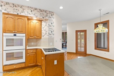 This unique, custom-built home rests on nearly  3/4  of an acre on Lockwood Folly Country Club in North Carolina - for sale on GolfHomes.com, golf home, golf lot