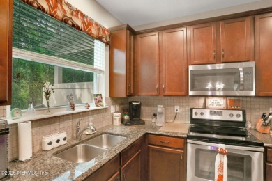 Live where charm meets convenience in this beautiful townhome on Slammer and Squire Golf Course in Florida - for sale on GolfHomes.com, golf home, golf lot