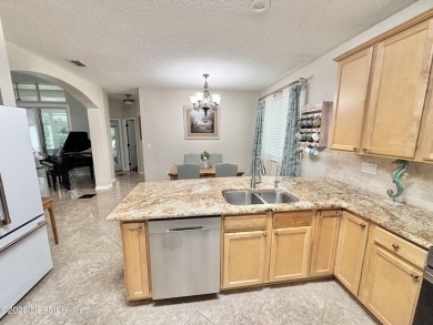 Beautifully Updated Chatham Village builders model home in on Golf Club At Fleming Island in Florida - for sale on GolfHomes.com, golf home, golf lot