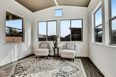 Tucked within the exclusive gated community of Verrado Highlands on Verrado Golf Club - Victory in Arizona - for sale on GolfHomes.com, golf home, golf lot