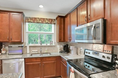 Live where charm meets convenience in this beautiful townhome on Slammer and Squire Golf Course in Florida - for sale on GolfHomes.com, golf home, golf lot