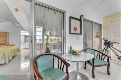 Enjoy South Florida living with this 2Bed/2Bath second floor on Hillsboro Pines Golf in Florida - for sale on GolfHomes.com, golf home, golf lot