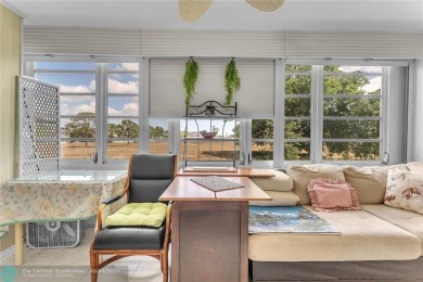 Enjoy South Florida living with this 2Bed/2Bath second floor on Hillsboro Pines Golf in Florida - for sale on GolfHomes.com, golf home, golf lot