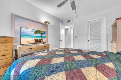 Enjoy South Florida living with this 2Bed/2Bath second floor on Hillsboro Pines Golf in Florida - for sale on GolfHomes.com, golf home, golf lot