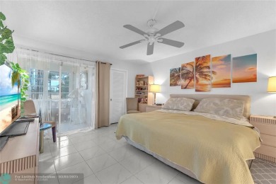 Enjoy South Florida living with this 2Bed/2Bath second floor on Hillsboro Pines Golf in Florida - for sale on GolfHomes.com, golf home, golf lot