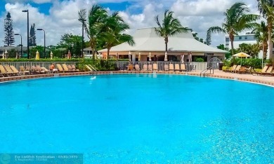 Enjoy South Florida living with this 2Bed/2Bath second floor on Hillsboro Pines Golf in Florida - for sale on GolfHomes.com, golf home, golf lot