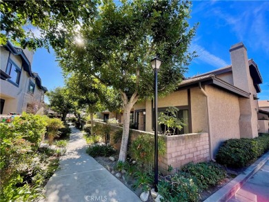 Welcome to this charming property with a spacious front and side on Rancho Duarte Golf Course in California - for sale on GolfHomes.com, golf home, golf lot