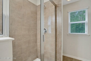 Live where charm meets convenience in this beautiful townhome on Slammer and Squire Golf Course in Florida - for sale on GolfHomes.com, golf home, golf lot