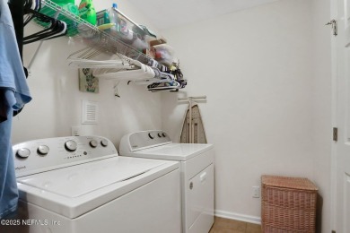 Live where charm meets convenience in this beautiful townhome on Slammer and Squire Golf Course in Florida - for sale on GolfHomes.com, golf home, golf lot