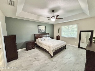 Beautifully Updated Chatham Village builders model home in on Golf Club At Fleming Island in Florida - for sale on GolfHomes.com, golf home, golf lot