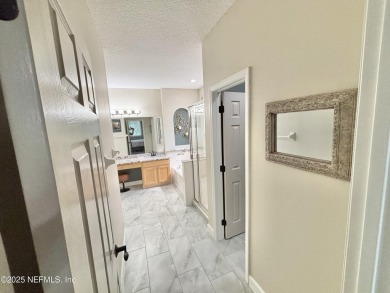 Beautifully Updated Chatham Village builders model home in on Golf Club At Fleming Island in Florida - for sale on GolfHomes.com, golf home, golf lot