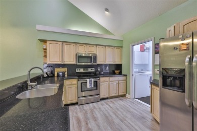 MAINTENANCE-FREE Living & MOVE-IN Ready! Welcome to effortless on The Golf Club of Cypress Creek in Florida - for sale on GolfHomes.com, golf home, golf lot