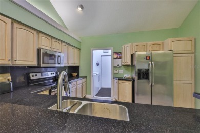 MAINTENANCE-FREE Living & MOVE-IN Ready! Welcome to effortless on The Golf Club of Cypress Creek in Florida - for sale on GolfHomes.com, golf home, golf lot