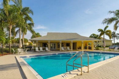 Experience the best of Jupiter living in this lovely very on The Golf Club of Jupiter in Florida - for sale on GolfHomes.com, golf home, golf lot