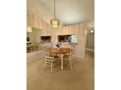 Experience the best of Jupiter living in this lovely very on The Golf Club of Jupiter in Florida - for sale on GolfHomes.com, golf home, golf lot