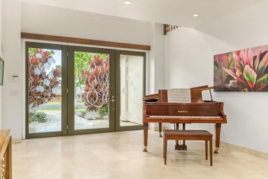 Enter this elegant Wailea Golf Vistas home through the bespoke on Wailea Golf Club in Hawaii - for sale on GolfHomes.com, golf home, golf lot