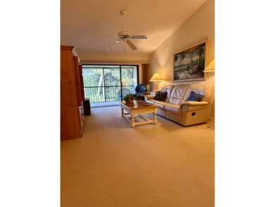 Experience the best of Jupiter living in this lovely very on The Golf Club of Jupiter in Florida - for sale on GolfHomes.com, golf home, golf lot