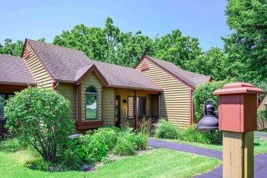 Nestled in a serene setting with tree-lined backdrop, this on Eagle Ridge Inn and Resort in Illinois - for sale on GolfHomes.com, golf home, golf lot