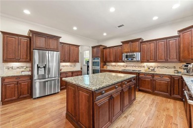 Introducing a truly stunning four-sides brick estate in the on Marietta Country Club in Georgia - for sale on GolfHomes.com, golf home, golf lot