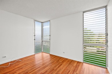 Enjoy golf course views from this centrally located 2-bedroom on Honolulu Country Club in Hawaii - for sale on GolfHomes.com, golf home, golf lot