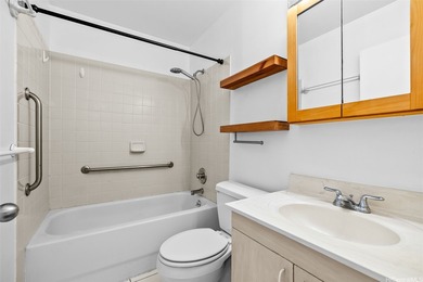 Enjoy golf course views from this centrally located 2-bedroom on Honolulu Country Club in Hawaii - for sale on GolfHomes.com, golf home, golf lot