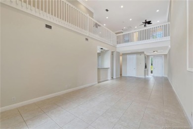Enjoy serene waterfront views and beautiful sunsets from this on Palm Cove Golf and Yacht Club in Florida - for sale on GolfHomes.com, golf home, golf lot