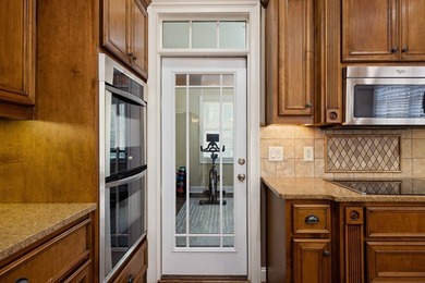 Located in the prestigious Maple Ridge subdivision, this on Maple Ridge Golf Club in Georgia - for sale on GolfHomes.com, golf home, golf lot