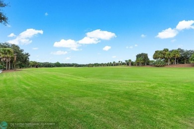 This prestigious 4 bedroom, 5 bath Parkland Golf  Country Club on Parkland Golf Club in Florida - for sale on GolfHomes.com, golf home, golf lot