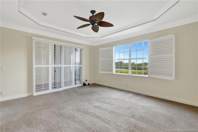 Enjoy serene waterfront views and beautiful sunsets from this on Palm Cove Golf and Yacht Club in Florida - for sale on GolfHomes.com, golf home, golf lot
