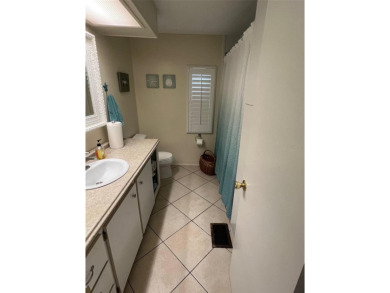 Step into the epitome of easy living in the heart of the popular on Palm Hill Golf Club in Florida - for sale on GolfHomes.com, golf home, golf lot