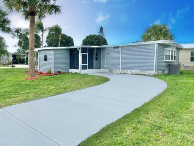 Remodeled Double-Wide manufactured home located in one of the on Barefoot Bay Golf Course in Florida - for sale on GolfHomes.com, golf home, golf lot