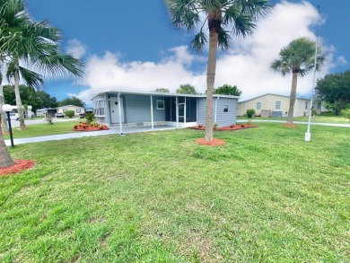 Remodeled Double-Wide manufactured home located in one of the on Barefoot Bay Golf Course in Florida - for sale on GolfHomes.com, golf home, golf lot